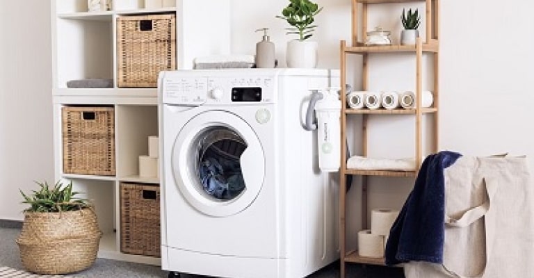 Someone comparing appliances while reading a buying guide.