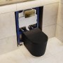 Matt Black Fluted Wall Hung Rimless Toilet with Soft Close Seat, Brushed Brass Pneumatic Flush Plate, 820mm Frame & Cistern – Oregon