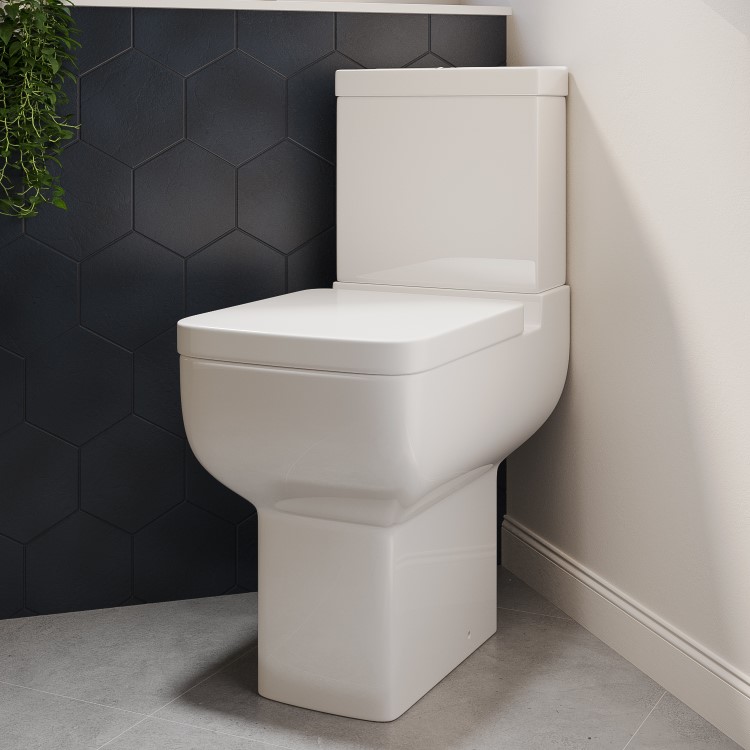 ALMOST PERFECT - Close Coupled Comfort Height Corner Toilet with Soft Close Seat - Seren