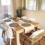 Set of 2 Brown Rattan Effect Dining Armchairs with Black Legs - Fion