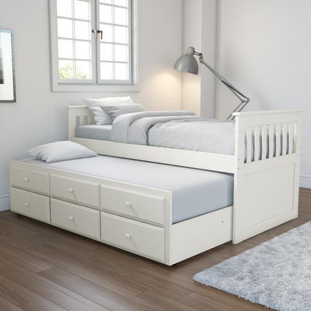 White bed with clearance trundle and storage