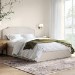 Cream Upholstered King Size Ottoman Bed with Scalloped Headboard- Siena