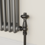 GRADE A1 - Maesta Matte Black Traditional TRV Angled Thermostatic Radiator Valves With Lockshield