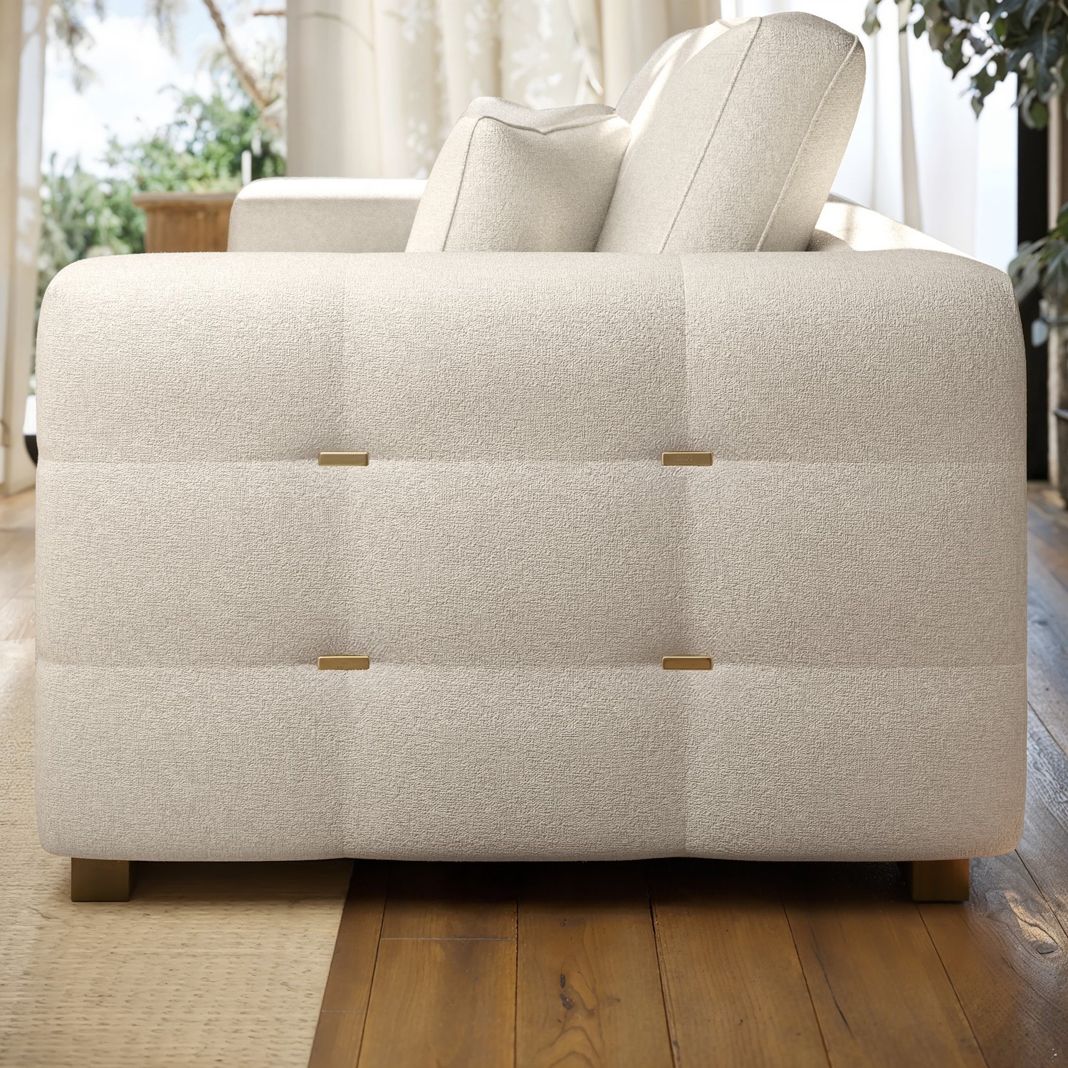 Side of beige 3-seater sofa