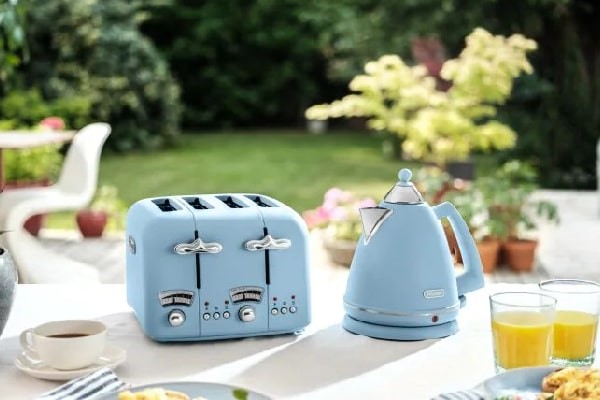 Delonghi Argento Kettle and Toaster Set Blue on a worktop