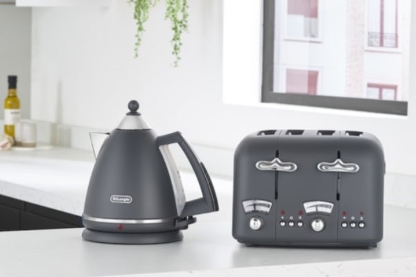 Delonghi Argento Kettle and Toaster Silva Set Grey on a worktop
