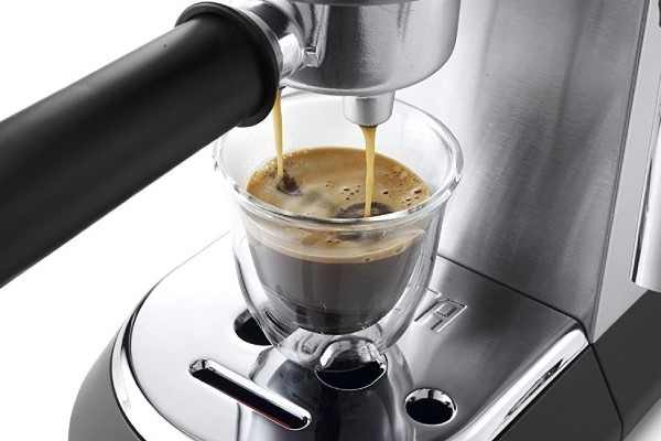 DeLonghi Dedica pouring espresso