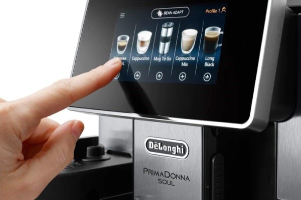 DeLonghi PrimaDonna Soul Coffee Machine touch controls being operated